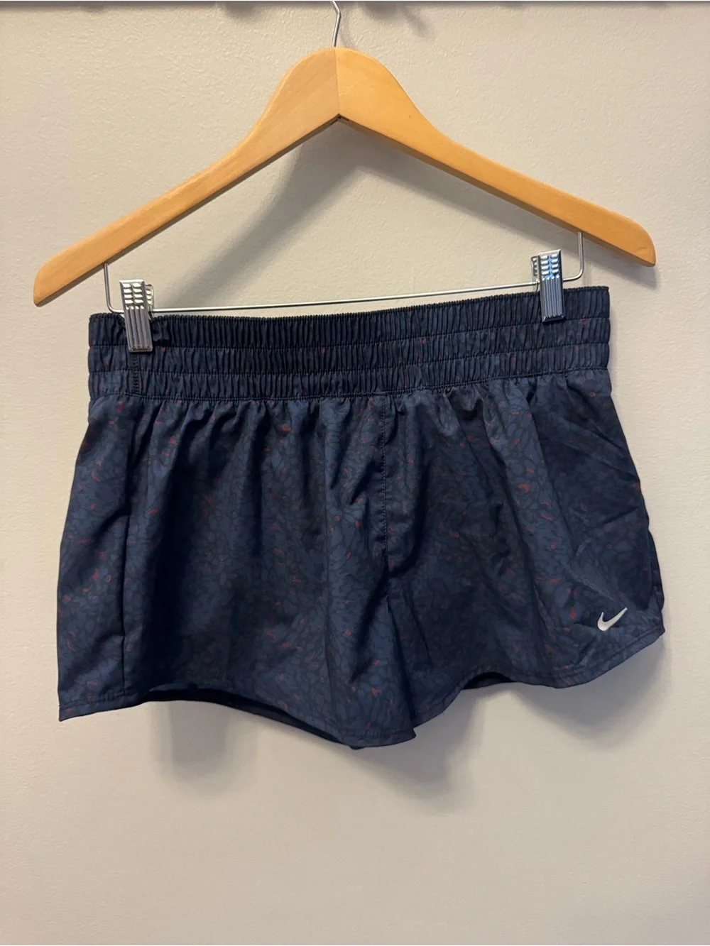 Nike Women’s Dark Navy Athletic Shorts with Subtle Red Print